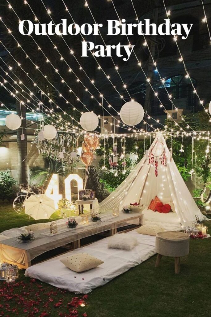 a beautiful birthday canopy decoration with fairy lights and ground seating